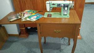 lot 815 image: Vintage Coronada Sewing Machine, Cabinet And More.