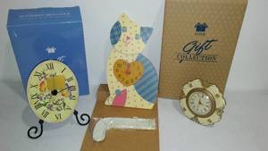 lot 831 image: Avon Clocks (3) Butterfly, Desk And Cat.