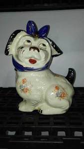lot 835 image: Shawnee Pottery Mugsy Dog Toothache Cookie Jar Circa 1950