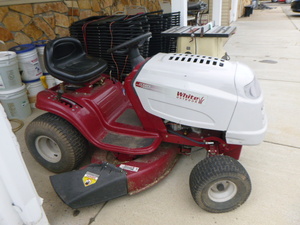 lot 6 image: White Outdoor Riding Lawn Mower