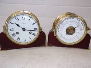 lot 42 image: Brass Lchatz Clock and Weather station with wood stands