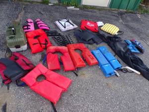 lot 72 image: Large Lot of life Jackets, Boat Cushions and wet suit