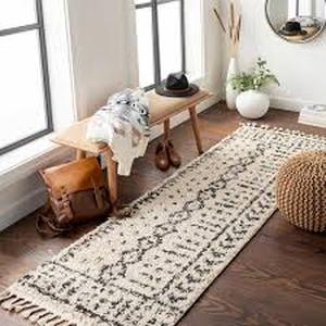 lot 22 image: HAUTELOOM Hauppauge 5 ft. X 7 ft. CharcoalPeach Area Rug Customer Returns See Pictures