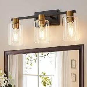 lot 53 image: Deyidn Farmhouse 19.68 in. 3-Light Black Modern Industrial Indoor Vanity Light with Clear Glass Shades, Bulbs Not Included Customer Returns See Pictures