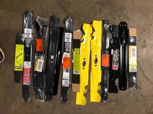 lot 29 image: Lot of Assorted Lawn Mower Blades Various Models and Conditions    Customer Returns See Pictures
