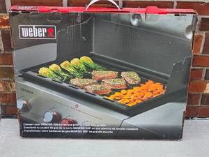 lot 97 image: Weber Genesis 300 Flat  Top Griddle Attachment