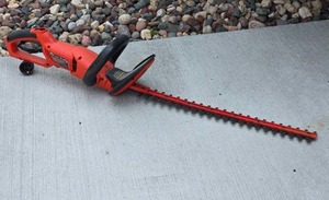 lot 95 image: Black & Decker Hedge Trimmer - HH2450