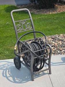 lot 93 image: Elegant Rolling Hose Reel with Garden Hose