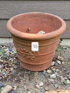 lot 88 image: Terra Cotta Planter with Floral Accent