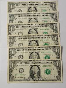lot 47 image: 6 Star Dollars - Great Condition - 1.00 denomination