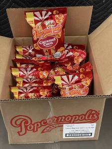 lot 197 image: Box of 12 Popcornopolis Caramel Corn Popcorn Bags 2.7 oz Each