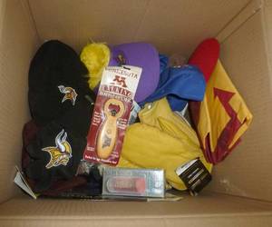 lot 27 image: Box of misc hats, gloves, bottle opener, rain poncho
