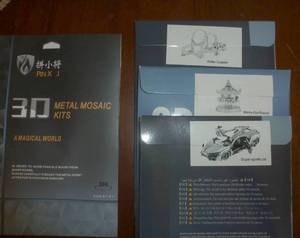 lot 134 image: 4 new metal models