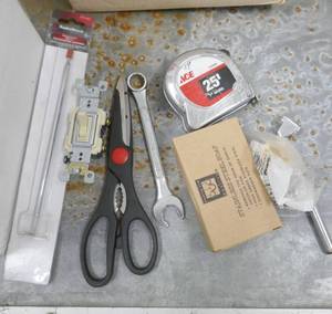 lot 167 image: Box with 9 bars of stainless soap to remove fish and onion smell, scissors, tape measure, wrench, NRA backpack bag, box of new coat hooks, 2 filet knives