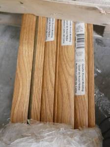 lot 175 image: Quarter round molding 94-116 x 34 AntiqueAugust Oak - approx 21 pieces
