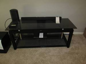 lot 88 image: Metal and glass entertainment cente...
