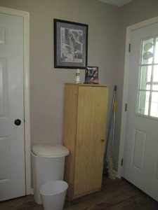 lot 105 image: Storage cabinet, artwork, patriotic...