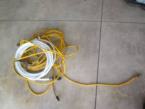 lot 115 image: Bungee Cords, garden hose and outdo...