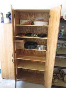 lot 46 image: Laminate 2-door and wood Pentey cab...