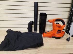lot 36 image: Black  Decker Corded 12 Amp High Performance Blower Vac Mulcher
