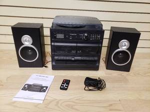 lot 37 image: Trexonic 3-Speed Turntable with CD Player, Double Cassette, BT, FM Radio, and USBSD Encode