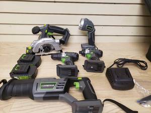 lot 54 image: Genesis 20V power tool kit Skill saw flash light drill impact sawzall 2 batterys and charger