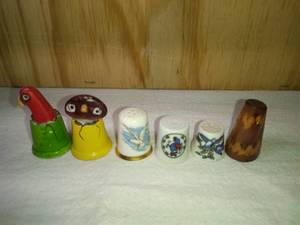 lot 90 image: 5 Ceramic Bird and 1 Leather Thimble (never used)