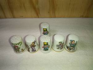 lot 104 image: 6 Ceramic Children Thimbles