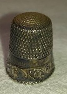 lot 125 image: Antique Sterling Silver Thimble. Tested