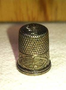 lot 128 image: Antique Sterling Silver Thimble. Tested