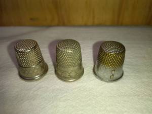lot 159 image: 1 Simmons Nickel Silver , 1 Ornate, and 1 Thread Cutter Thimbles
