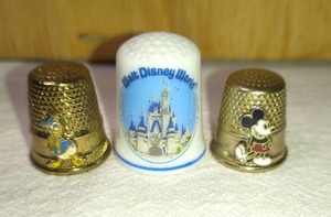 lot 179 image: Metal Daffy and Mickey and Disney World Thimbles