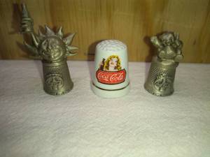 lot 181 image: 3 Coca Cola Thimbles