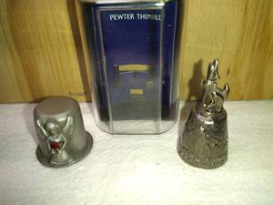 lot 201 image: South Dakota Howling Wolf Thimble with Case and January Angel with Birthstone