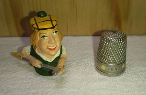 lot 203 image: Pewter Painted Golfer with Hinged Hat and ILES Nickel Ventilated Thimbles