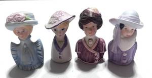 lot 15 image: Set of 4 Avon American Fashion Silhouette Thimbles