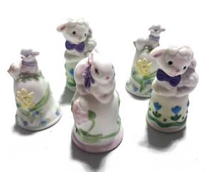 lot 23 image: Set of 5 Enesco Lamb and Bunny Thimbles