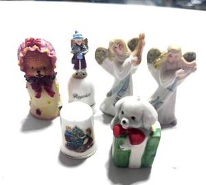 lot 27 image: 2 Enesco Angel Thimbles and 4 Misc. Thimbles