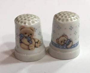 lot 53 image: Two Teddy Bear Thimbles