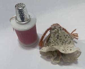 lot 3 image: Vintage Sweet Honesty Cologne Sewing Themed Bottle and Clothes Pin Girl