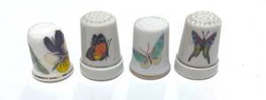 lot 4 image: Set of 4 Ceramic Butterfly Thimbles