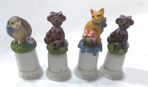 lot 22 image: Set of 4 Avon Animal Thimbles