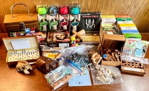 lot 159 image: Collection of Wooden Puzzles, Kendama Toys, and Game Sets with Decorative Wood Box