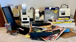 lot 253 image: Office Supply Collection with Calculators, Rulers, Staplers, and Accessories