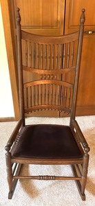 lot 66 image: Vintage Wooden High-Back Rocking Chair with Spindle Detail