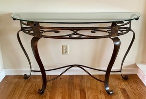 lot 133 image: Glass Top Metal Console Table with Decorative Scrollwork