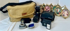 lot 223 image: Vintage Camera Bag with Polaroid Spectra SE, Lenses, Flashes, and Photo Frame Collection