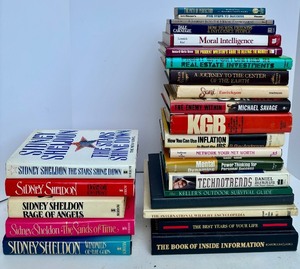 lot 93 image: Collection of 20 Hardcover and Paperback Books by Sidney Sheldon and Others