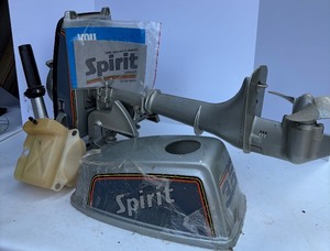 lot 110 image: Spirit 3.5 HP Outboard Boat Motor with Cover, Parts, and 1980 Manual