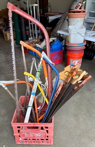 lot 112 image: Hand Saw and Garden Tool Lot in Dairy Crate